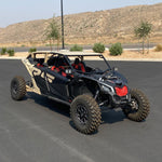 canam x3 with voodoo roll cage installed with black and tan coloring 
